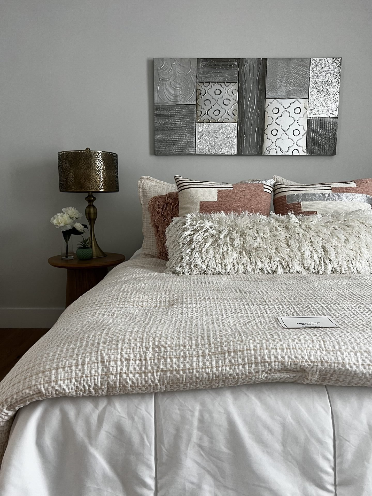 Modern staging project showcasing an main bedroom and bed.