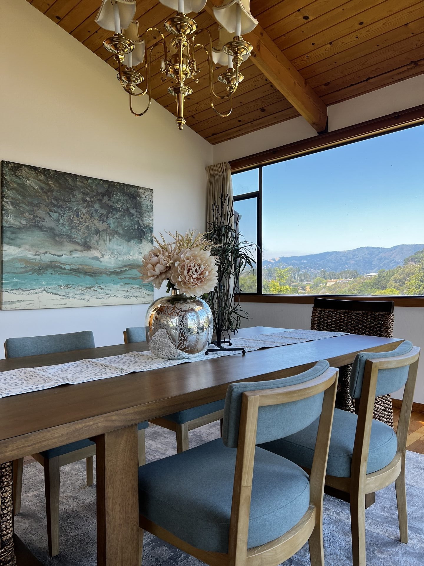 Large windows and natural light in a staged luxury home interior.
